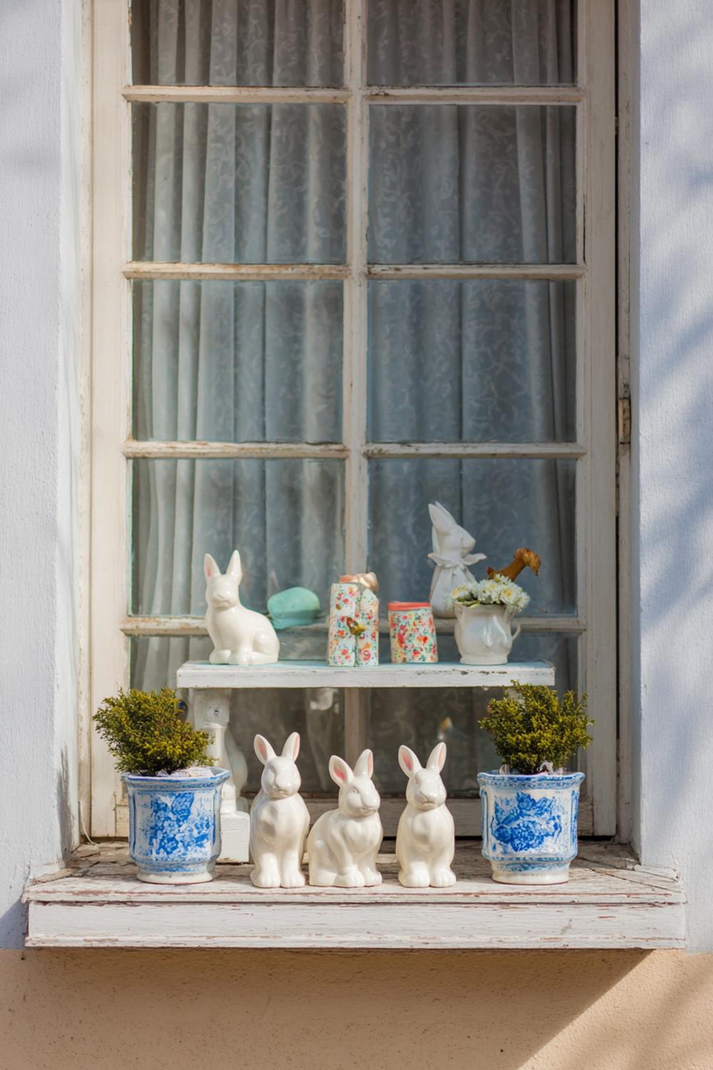 15. Oster-Fensterbank mit Porzellanhasen und Moos