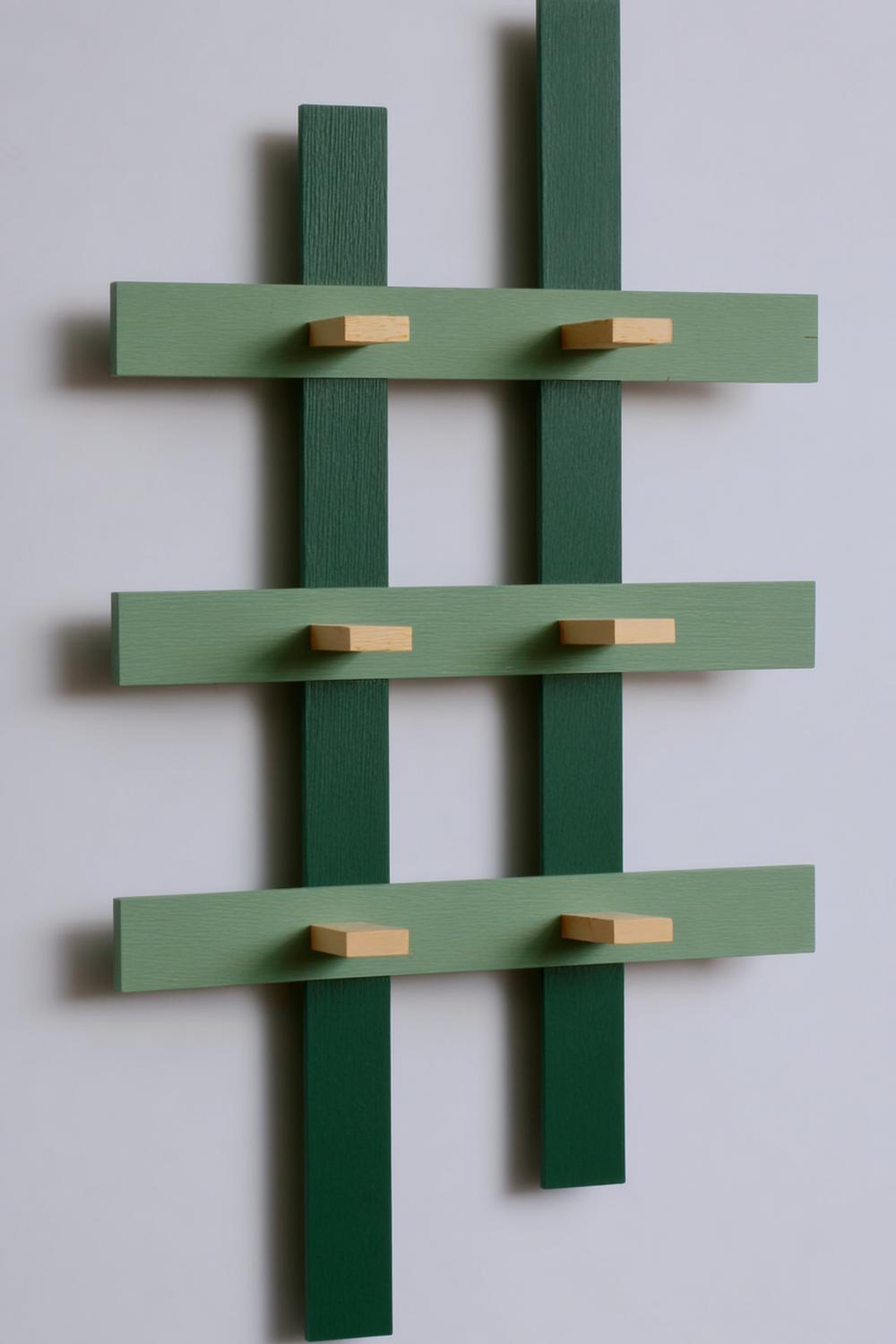 31. Wanddeko ohne Bohren mit geometrischen Holzleisten in Tannengrün und ablösbarem Montageband